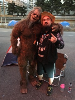 Interview with Bigfoot in Seattle, WA. In the picture with the interviewer: Lane Steele.